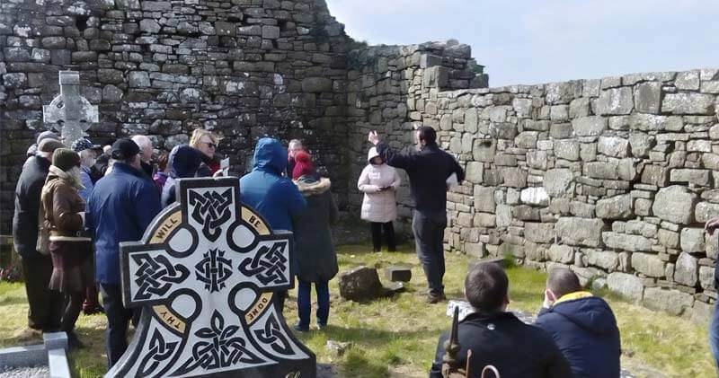 Group on a tour of Rathcroghan Visitor Centre