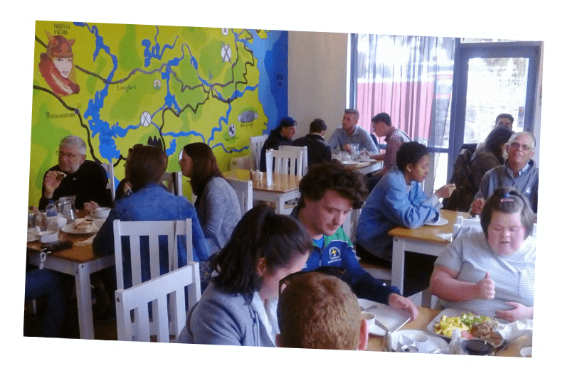 tain_cafe Group of people having meal at tain cafe